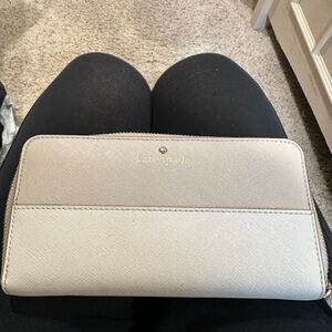 Two toned Kate Spade zip around continental wallet